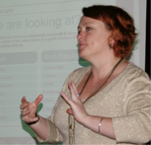 Webmaster: Michelle Cooper explains the DU website.   Photos: Liz Brook.